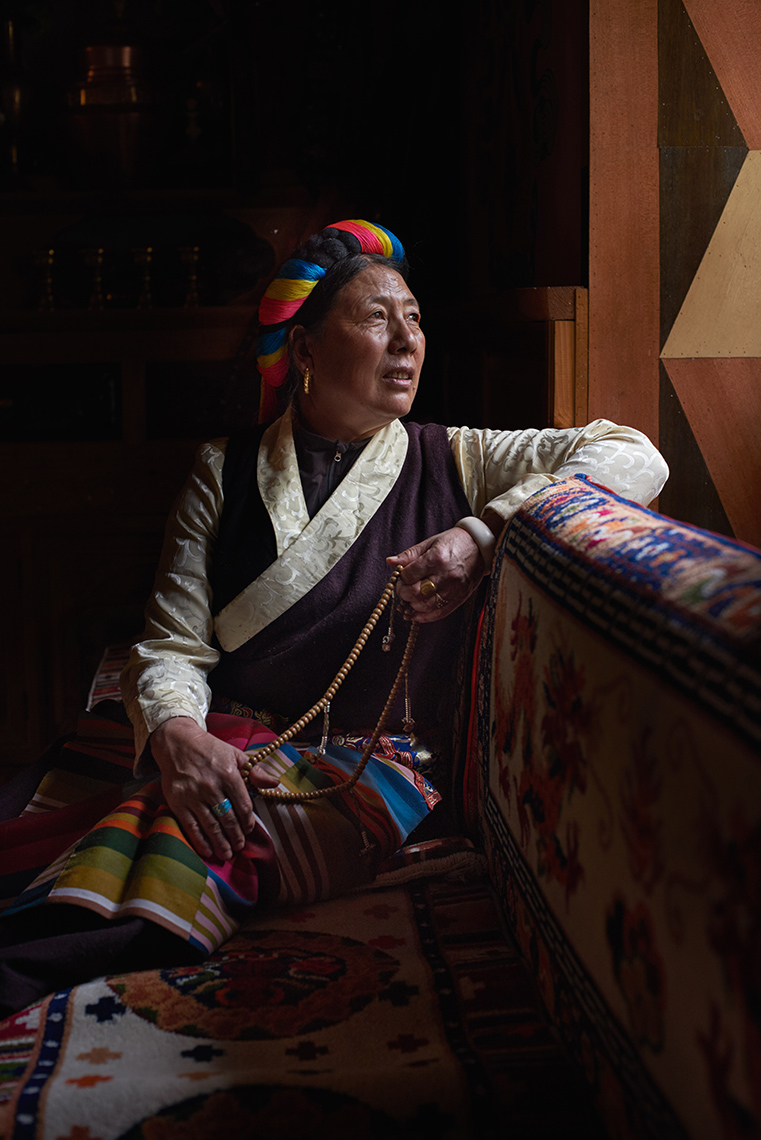 Ethnic Khampa Tibetan in her Himalayan village home