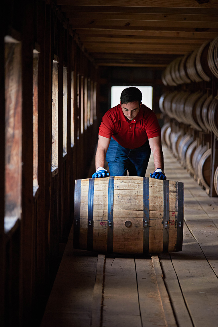 Barrel rolling at a bourbon distillery in Kentucky, USA