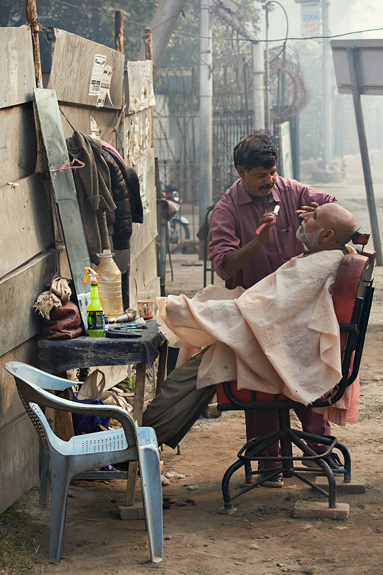Street barber, Lahore, Pakistan