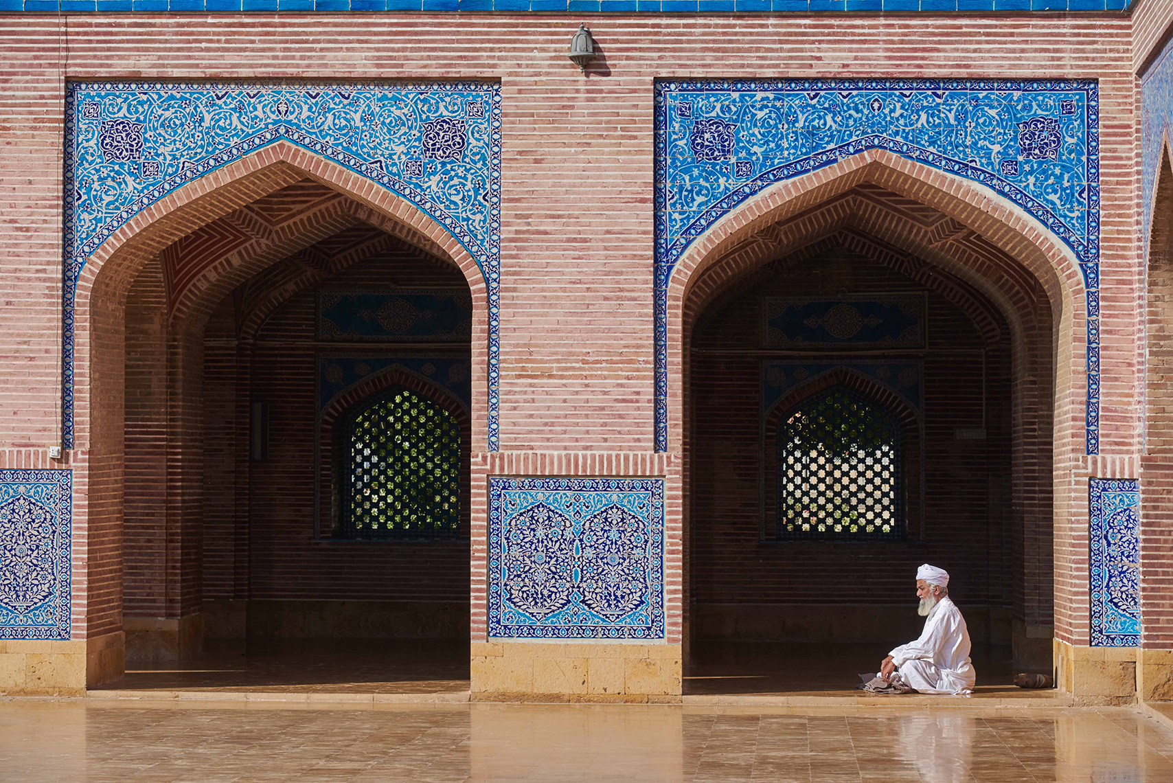 Worshipper at the Mughal-era mosque of Thatta, Pakistan